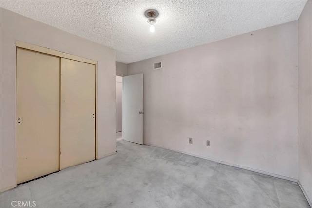 1510 E Newcrest Dr, West Covina, CA 91792 - unfurnished bedroom featuring carpet floors, a closet, and a textured ceiling