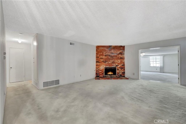 1510 E Newcrest Dr, West Covina, CA 91792 - unfurnished living room featuring a fireplace and a textured ceiling
