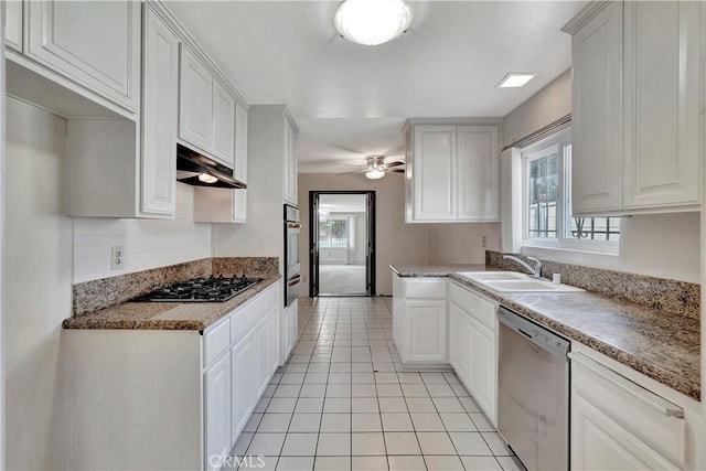 1510 E Newcrest Dr, West Covina, CA 91792 - kitchen with appliances with stainless steel finishes, under cabinet range hood, healthy amount of natural light, and a warming drawer