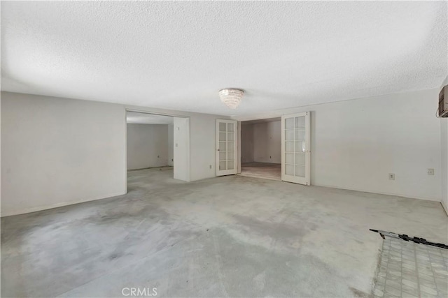 1510 E Newcrest Dr, West Covina, CA 91792 - basement featuring a textured ceiling and french doors