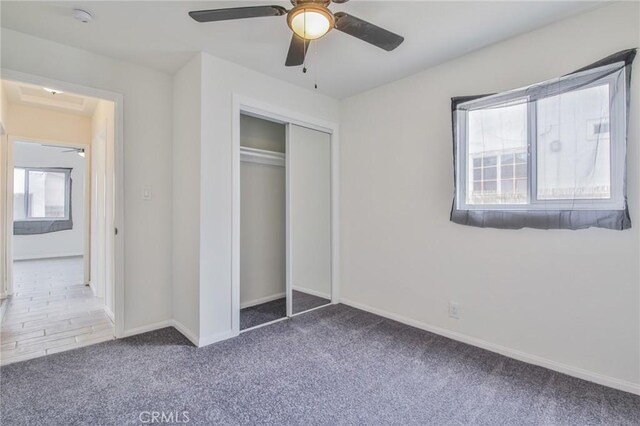 223 E 83rd St, Los Angeles, CA 90003 - unfurnished bedroom featuring carpet, a closet, and a ceiling fan