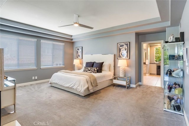2155 Chandler Dr, Tustin, CA 92782 - bedroom featuring a tray ceiling, carpet, and ceiling fan