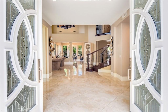 2155 Chandler Dr, Tustin, CA 92782 - foyer entrance featuring stairs and french doors