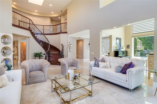 2155 Chandler Dr, Tustin, CA 92782 - living area featuring a high ceiling, stairway, light marble finish flooring, and recessed lighting