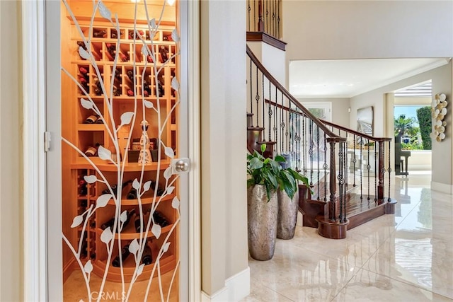 2155 Chandler Dr, Tustin, CA 92782 - wine cellar featuring ornamental molding and tile patterned flooring