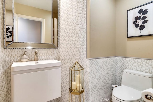 2155 Chandler Dr, Tustin, CA 92782 - bathroom featuring tile walls, vanity, and wainscoting