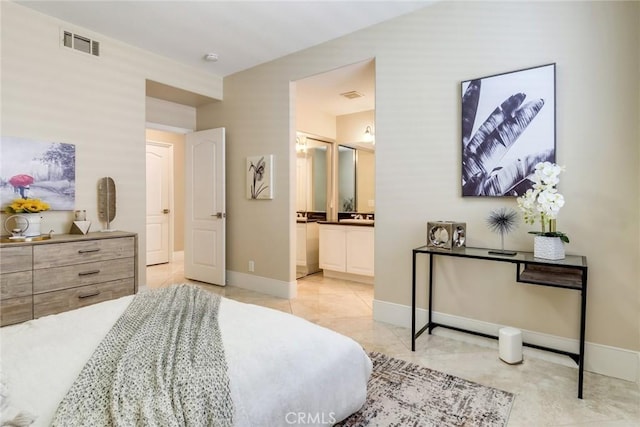 2155 Chandler Dr, Tustin, CA 92782 - bedroom with baseboards and connected bathroom
