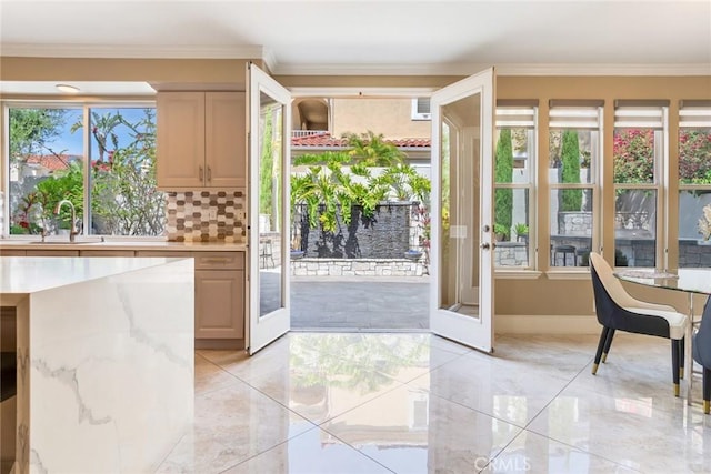2155 Chandler Dr, Tustin, CA 92782 - doorway to outside featuring ornamental molding