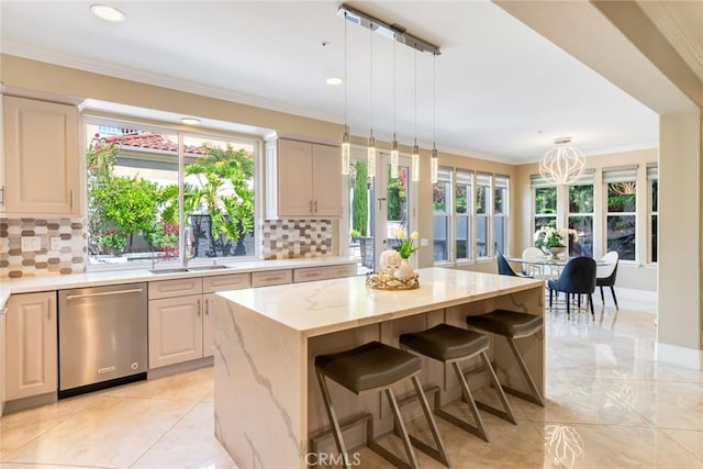 2155 Chandler Dr, Tustin, CA 92782 - kitchen with dishwasher, plenty of natural light, backsplash, crown molding, and recessed lighting
