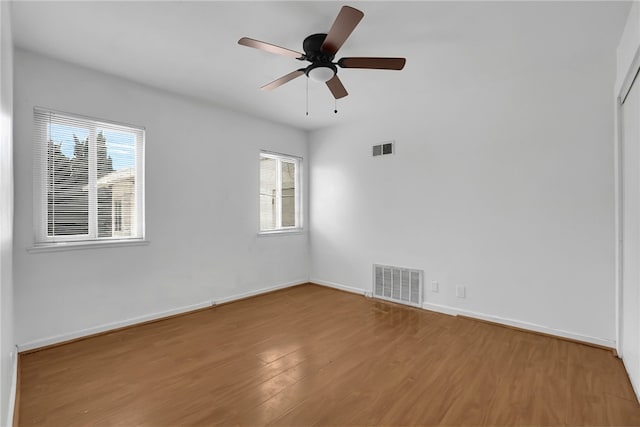 112 E Central Ave, San Gabriel, CA 91776 - empty room with healthy amount of natural light, wood finished floors, and a ceiling fan