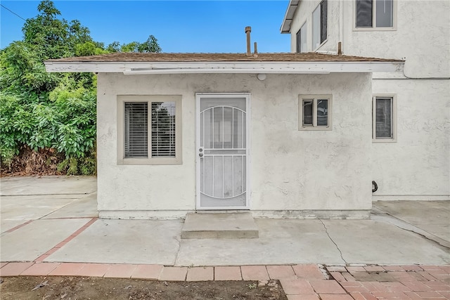 112 E Central Ave, San Gabriel, CA 91776 - property entrance with stucco siding and a patio area
