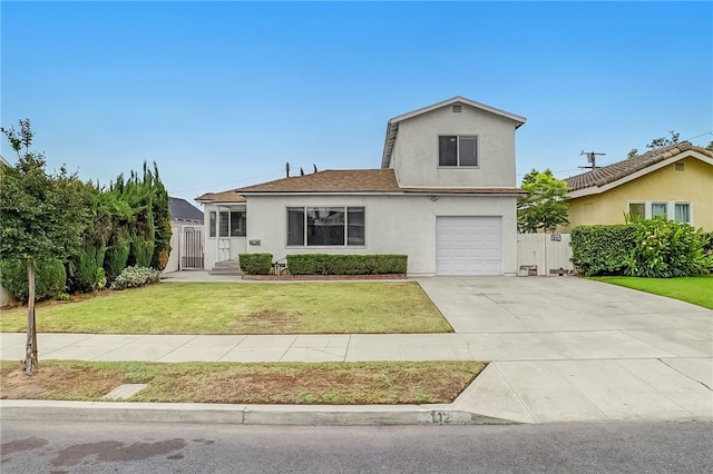 112 E Central Ave, San Gabriel, CA 91776 - view of front of property with an attached garage, stucco siding, and driveway