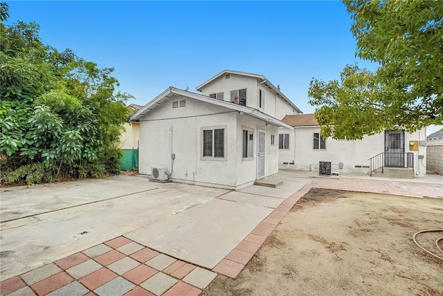 112 E Central Ave, San Gabriel, CA 91776 - back of property with stucco siding and a patio area