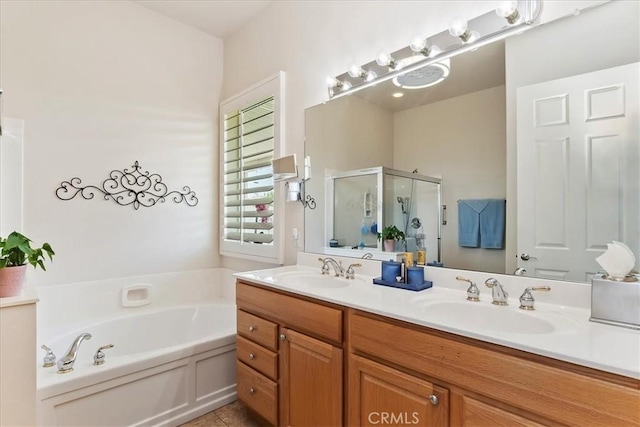 875 Eastlake Rd, Beaumont, CA 92223 - full bathroom with a stall shower, a garden tub, double vanity, and tile patterned flooring
