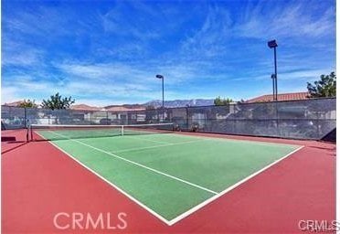 875 Eastlake Rd, Beaumont, CA 92223 - view of tennis court with community basketball court