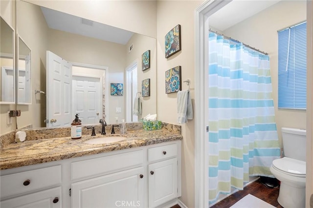 2635 Sunshine Valley Ct, Simi Valley, CA 93063 - full bathroom featuring wood finished floors, vanity, and a shower with shower curtain