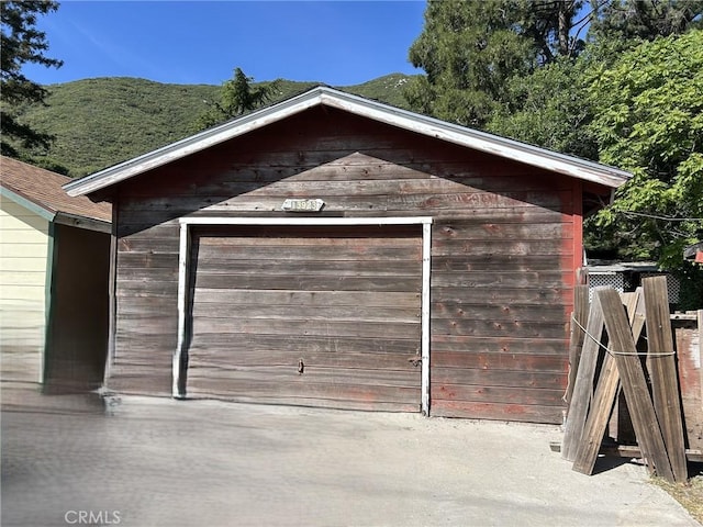 13923 Meadow Ln, Lytle Creek, CA 92358 - garage featuring driveway
