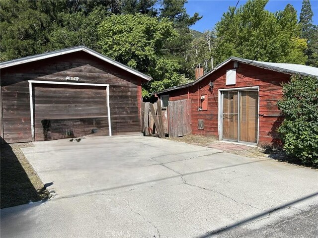 13923 Meadow Ln, Lytle Creek, CA 92358 - detached garage featuring driveway