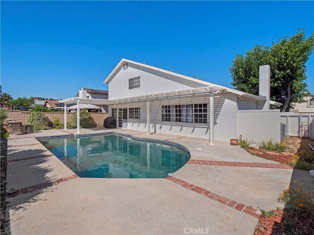 22905 Las Mananitas Dr, Valencia, CA 91354 - view of pool with a pergola, a patio, and a fenced backyard