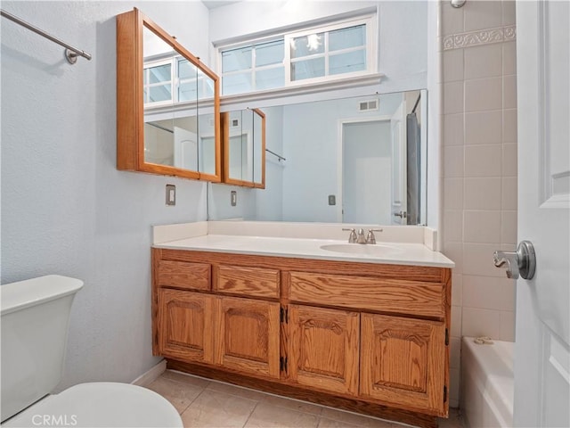22905 Las Mananitas Dr, Valencia, CA 91354 - bathroom featuring vanity, shower / tub combination, and tile patterned floors