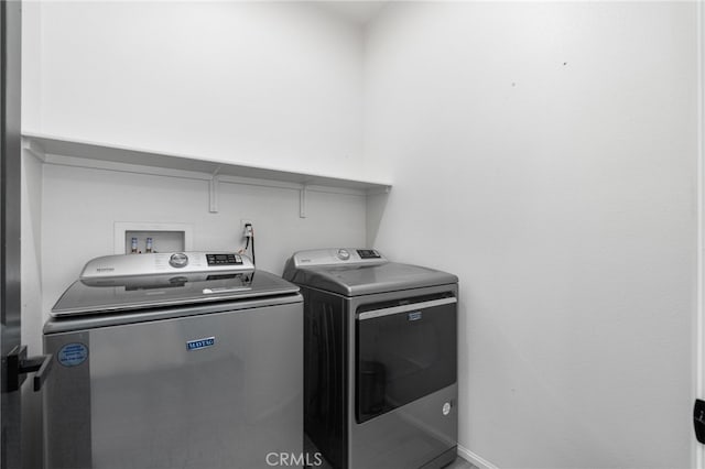 4360 Rima Dr, Fontana, CA 92336 - laundry room featuring independent washer and dryer and baseboards