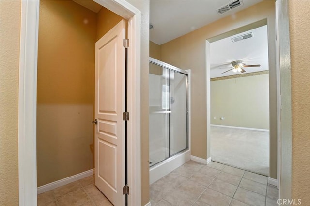 1544 Big Bnd, Beaumont, CA 92223 - full bath featuring ceiling fan, a stall shower, and tile patterned floors
