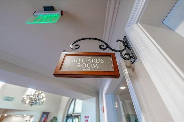 1544 Big Bnd, Beaumont, CA 92223 - detailed view of crown molding and a chandelier