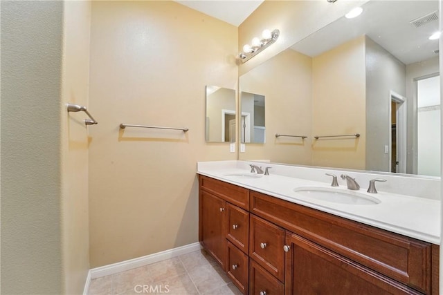 1544 Big Bnd, Beaumont, CA 92223 - bathroom with double vanity and tile patterned flooring