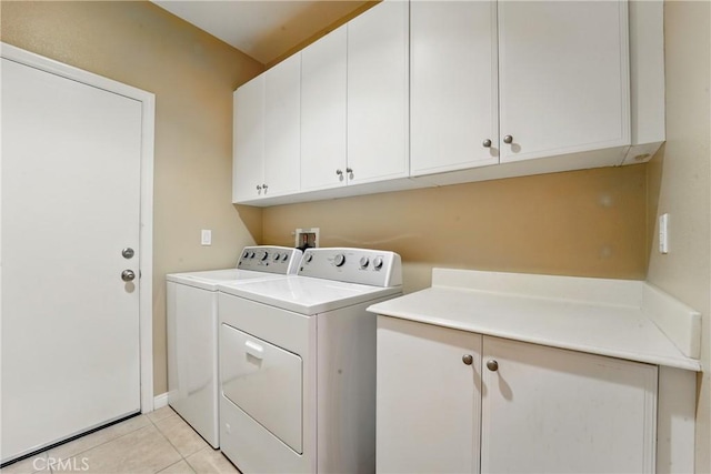 1544 Big Bnd, Beaumont, CA 92223 - laundry area with washer and clothes dryer, cabinet space, and light tile patterned floors