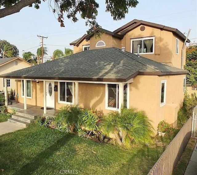 2730 Hayes Ave, Long Beach, CA 90810 - view of front of property featuring roof with shingles and stucco siding