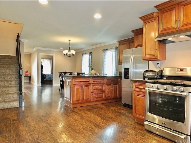 2730 Hayes Ave, Long Beach, CA 90810 - kitchen with stainless steel appliances, under cabinet range hood, brown cabinetry, dark countertops, and crown molding