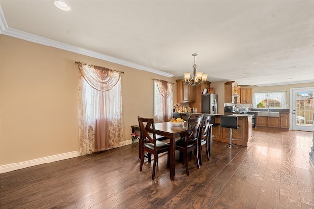 2730 Hayes Ave, Long Beach, CA 90810 - dining area with a chandelier, wood-type flooring, ornamental molding, and recessed lighting