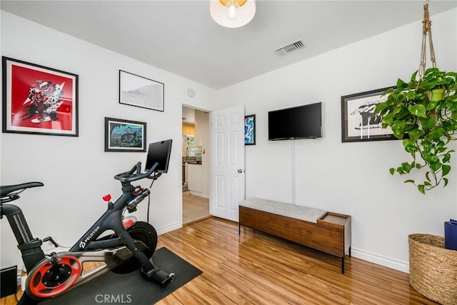 4115 E 10th St, Long Beach, CA 90804 - workout area with wood finished floors and baseboards