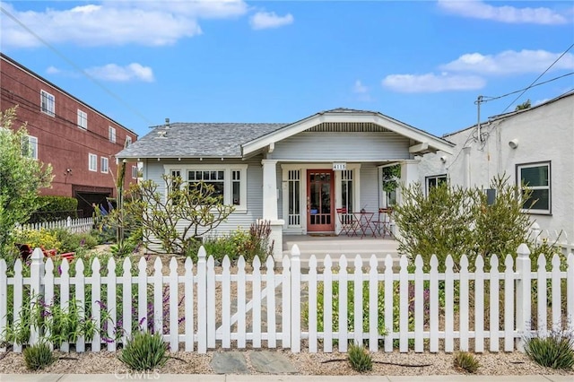 4115 E 10th St, Long Beach, CA 90804 - bungalow-style house with covered porch and a fenced front yard