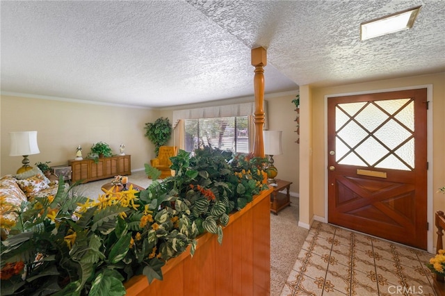 12429 Baker Ave, Chino, CA 91710 - foyer entrance with light carpet, a textured ceiling, and ornamental molding