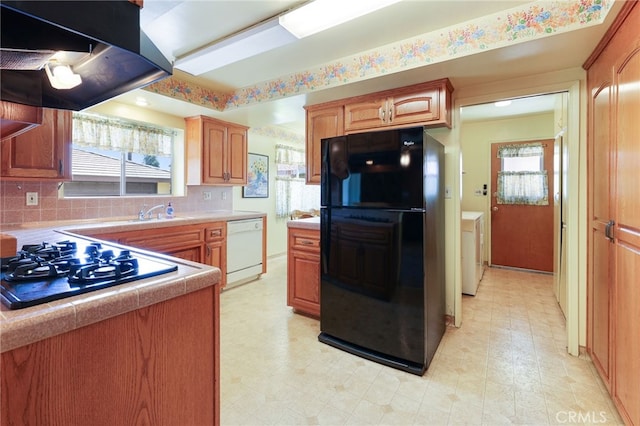 12429 Baker Ave, Chino, CA 91710 - kitchen featuring freestanding refrigerator, dishwasher, gas cooktop, exhaust hood, and light floors