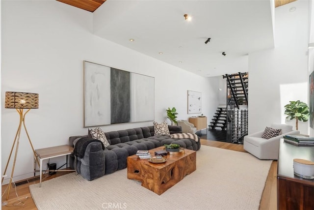 417 Sunset Ave Unit 1.2, Venice, CA 90291 - living room featuring wood finished floors and stairs
