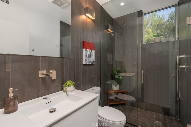 417 Sunset Ave Unit 1.2, Venice, CA 90291 - bathroom with a shower stall, vanity, and tile walls