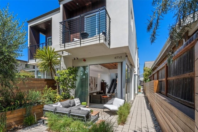 417 Sunset Ave Unit 1.2, Venice, CA 90291 - rear view of property featuring outdoor lounge area and stucco siding