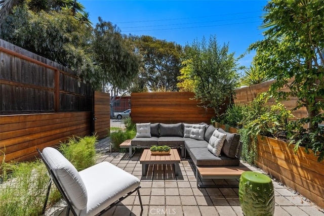 417 Sunset Ave Unit 1.2, Venice, CA 90291 - fenced backyard with outdoor lounge area and a patio