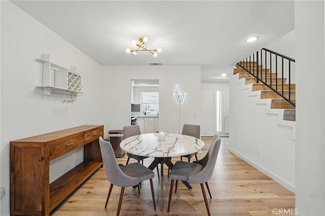 14861 Mulberry Dr Unit 1310, Whittier, CA 90604 - dining room featuring stairway, light wood finished floors, a chandelier, and recessed lighting