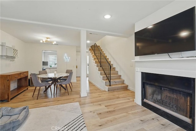 14861 Mulberry Dr Unit 1310, Whittier, CA 90604 - living area featuring stairs, wood finished floors, a fireplace, and recessed lighting
