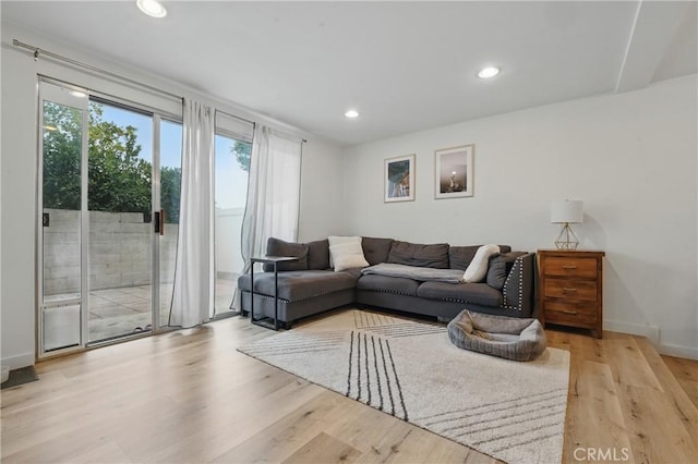 14861 Mulberry Dr Unit 1310, Whittier, CA 90604 - living room featuring wood finished floors and recessed lighting