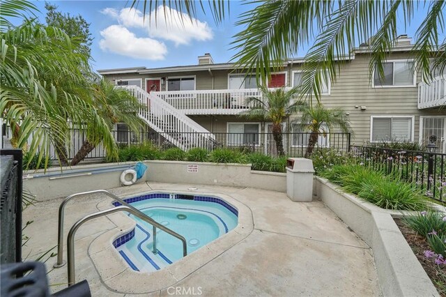14861 Mulberry Dr Unit 1310, Whittier, CA 90604 - view of swimming pool featuring a community hot tub