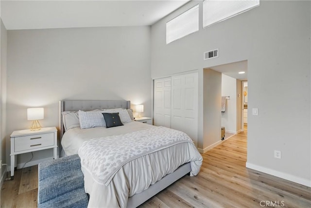 14861 Mulberry Dr Unit 1310, Whittier, CA 90604 - bedroom with light wood finished floors, a closet, and a high ceiling