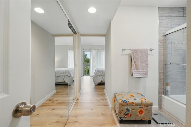 14861 Mulberry Dr Unit 1310, Whittier, CA 90604 - hall featuring wood finished floors and baseboards