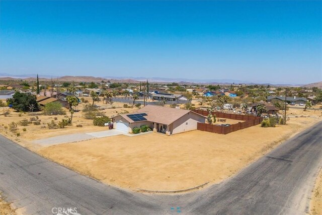 3715 Surrey, Yucca Valley, CA 92284 - aerial view of residential area featuring a mountainous background