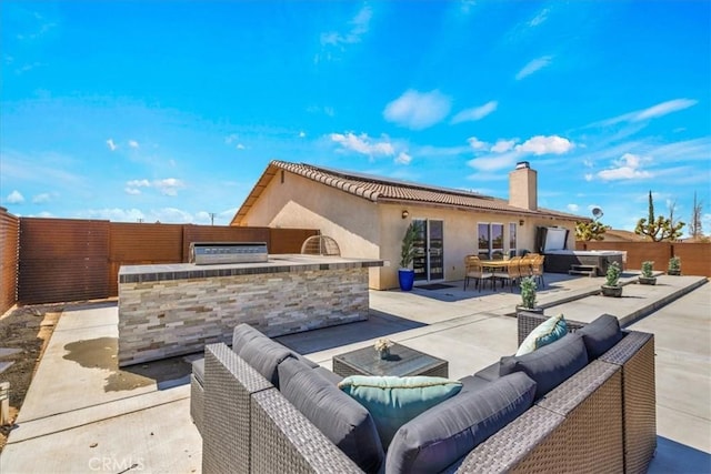 3715 Surrey, Yucca Valley, CA 92284 - fenced backyard featuring outdoor lounge area, area for grilling, and a patio area