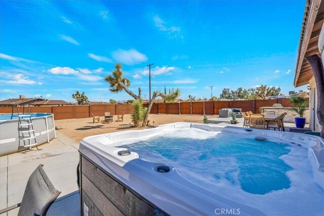 3715 Surrey, Yucca Valley, CA 92284 - view of pool with a hot tub, a fenced backyard, and a patio area