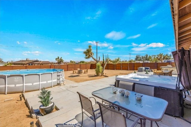 3715 Surrey, Yucca Valley, CA 92284 - fenced backyard featuring outdoor dining space, a patio area, and a trampoline
